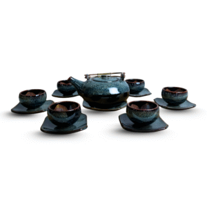 Bộ ấm chén men hỏa biến xanh ghi đúc lòng hoa